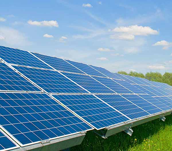 Engineer in charge of solar panel installation The installation of solar energy conversion into electricity for a warehouse is currently being investigated.